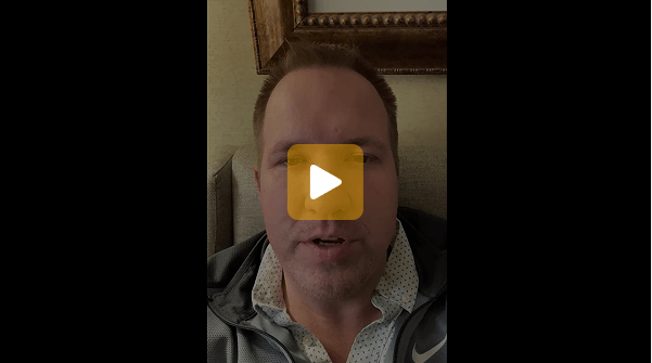 Video thumbnail showing a man speaking directly to the camera.