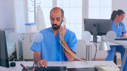 AI Receptionist vs Answering Service for Chiropractors